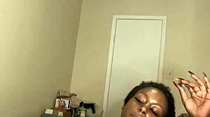 Ebony MILF masturbates with dildo and smokes